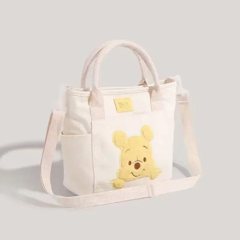 Disney Cute Cartoon Winnie the Pooh Canvas Crossbody Bag Doll Portable Handheld Crossbody Two-Purpose Bag